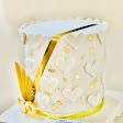 Elegant ivory and gold cake by DICE & more